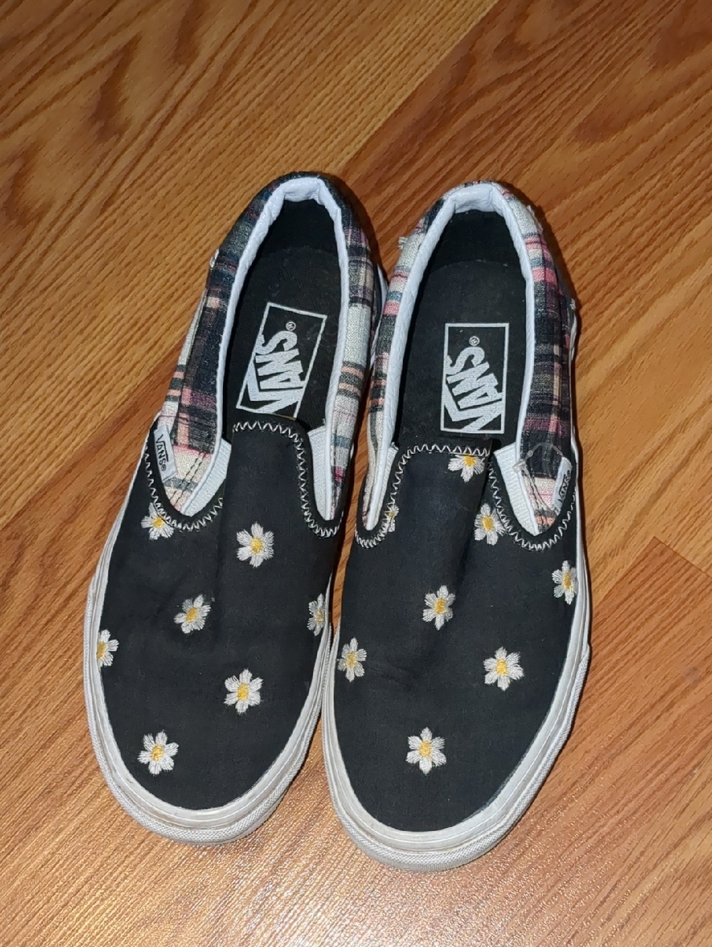 Vans Black Slip-On Sneakers with White & Yellow Daisy Embroidery